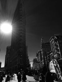 Low angle view of illuminated buildings against sky