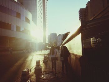 People on street in city