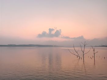 Scenic view of sea against sky during sunset