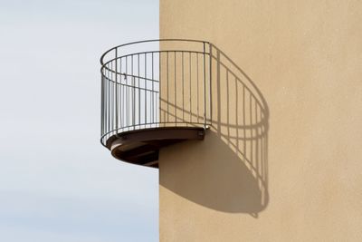 Low angle view of building balcony against sky