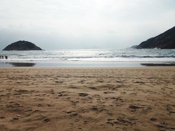 Scenic view of beach against sky