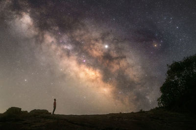 Scenic view of star field against sky at night