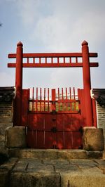 Low angle view of red structure against sky