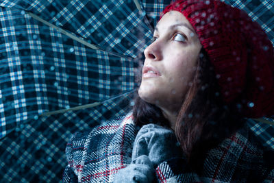 Portrait of woman looking at camera