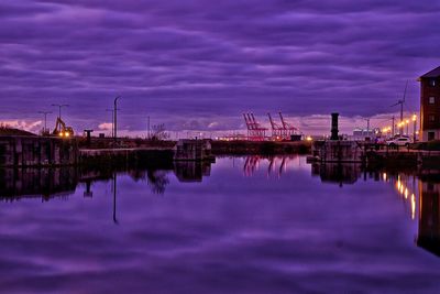 Reflection of sky in harbor at night