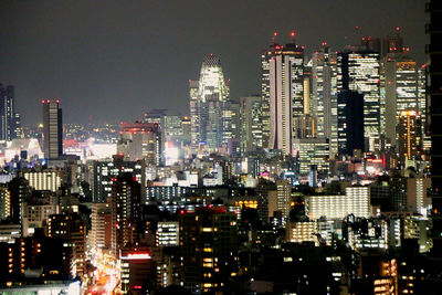 Illuminated cityscape at night