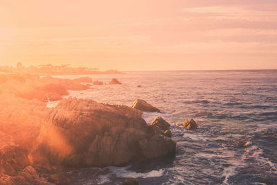 Scenic view of sea at sunset