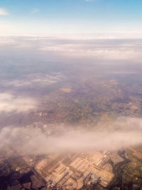 Aerial view of city against sky