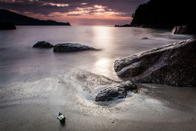 Scenic view of sea against sky at sunset