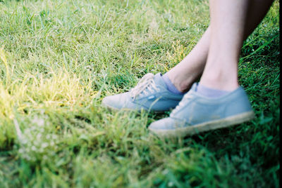 Low section of child on field