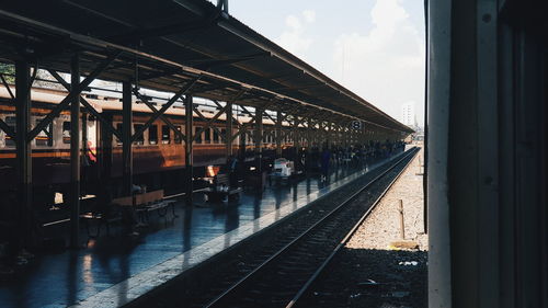 Railroad station platform seen through train window