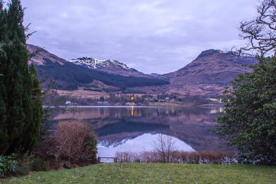 Scenic reflection of rocky landscape in lake