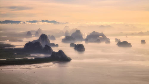 Scenic view of sea against sky at sunset