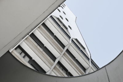 Low angle view of building against clear blue sky