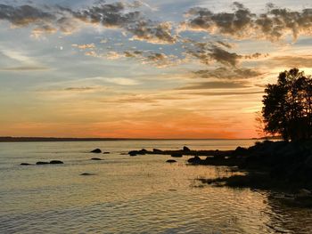 View of calm sea at sunset