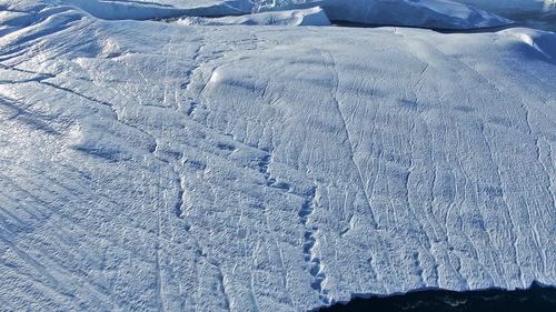 High angle view of snow covered land