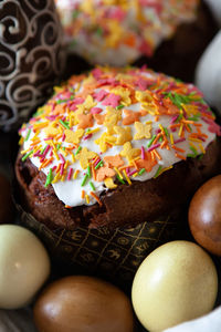 Easter cake decorated with colored sprinkles, colored eggs in natural colors, close-up. soft 