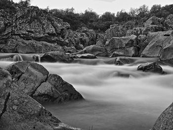 River flowing amidst rock formations
