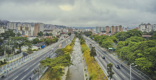 High angle view of city street against sky