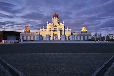 View of building against cloudy sky