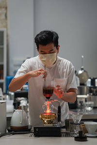 Man brewing coffee