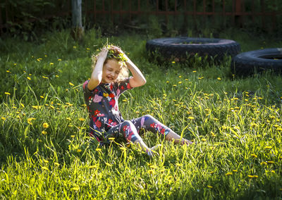 Full length of girl on field