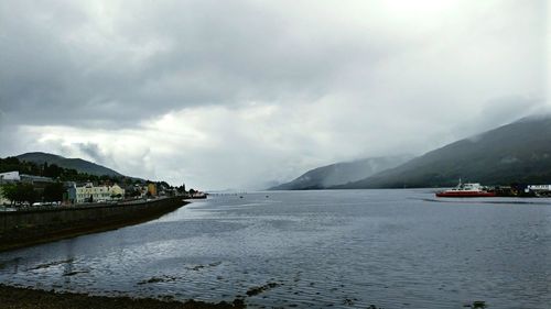 Scenic view of sea against cloudy sky