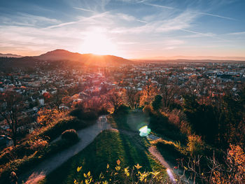 High angle view of cityscape against sky during sunset