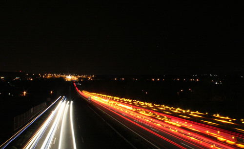 Light trails on road at night