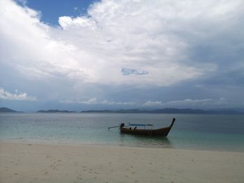 Boat in sea against sky