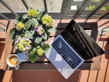 High angle view of flower vase on table
