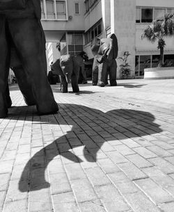 People walking on street in city