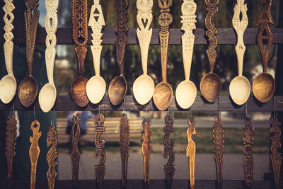 Close-up of clothes hanging for sale