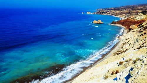 High angle view of beach against blue sky