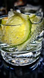 Close-up of lime slices in water