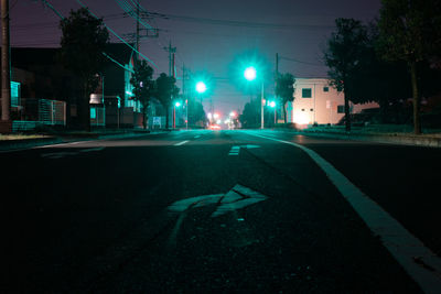 Shadow of person on road at night