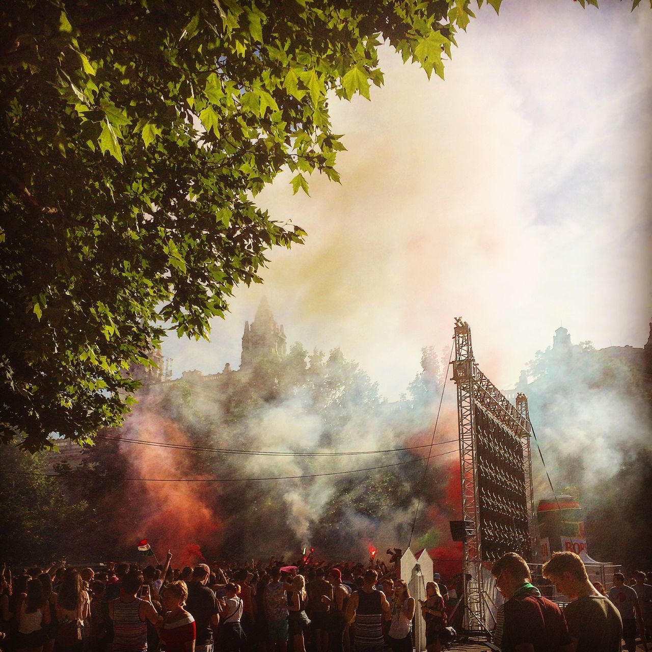 large group of people, crowd, men, lifestyles, weather, sky, leisure activity, illuminated, indoors, person, tree, rain, night, wet, dusk, togetherness, cloud - sky, smoke - physical structure, silhouette