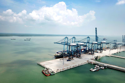 High angle view of pier over sea against sky