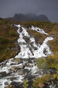 Scenic view of stream against sky