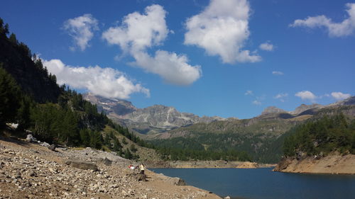 Scenic view of landscape and mountains against sky