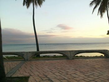 Scenic view of sea at sunset