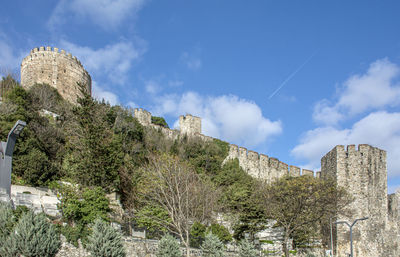 Low angle view of fort against sky