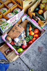 High angle view of vegetables in boxes at market