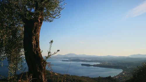 Scenic view of landscape against sky at sunset