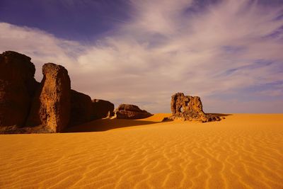 Scenic view of desert against sky