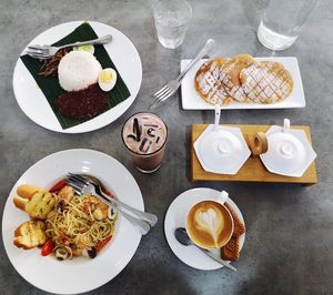 High angle view of food served on table