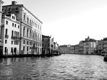 Grand canal amidst buildings against clear sky