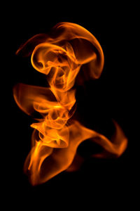 Close-up of fire against black background