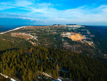 Aerial view of landscape and sea against sky