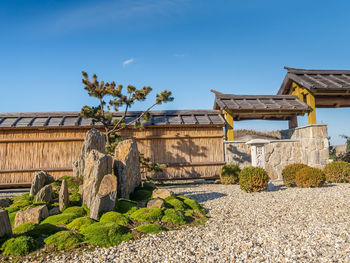 Typical japanese rock garden with little shrine